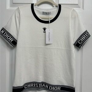 Stretchy White fashion top with black trim